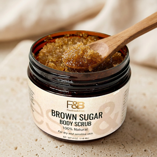 Brown Sugar Body Scrub in a labeled amber jar with a wooden spoon lifting the scrub.